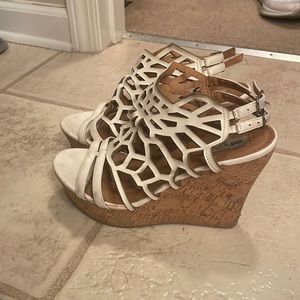 Women’s size 8, high wedge, shoe with white double straps & textured design